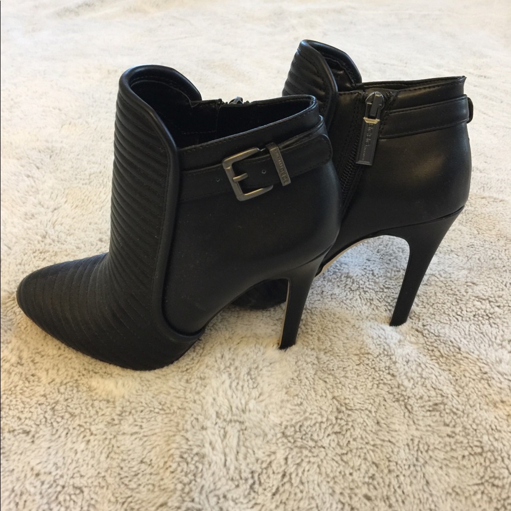 BCBG Black ankle high heel boots